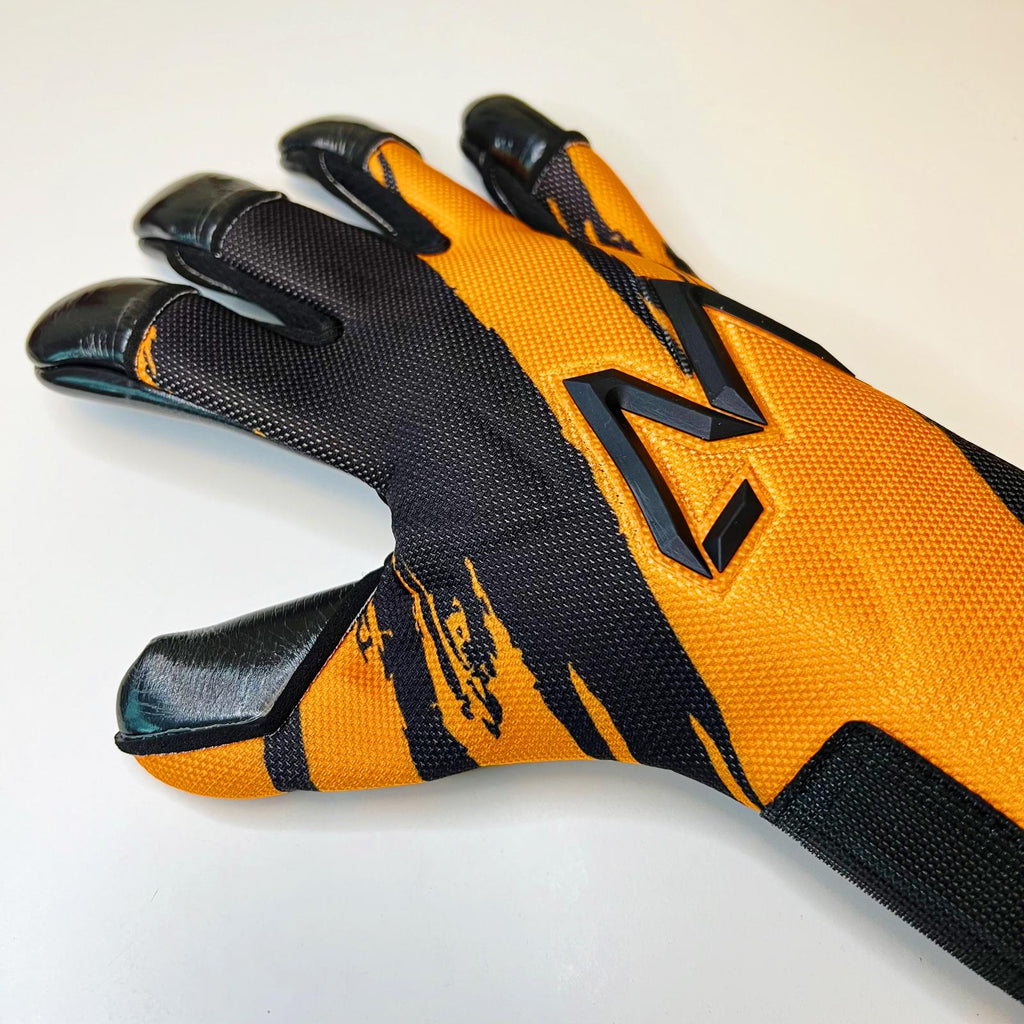 AM Ukkonen 1.0 goalkeeper gloves black orange finger tips and backhand side view – AM Gloves