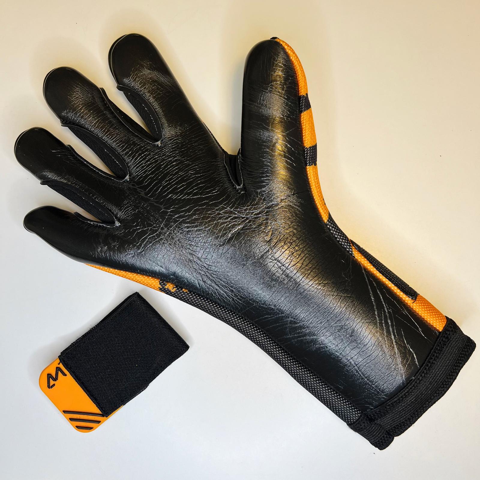 AM Ukkonen 1.0 goalkeeper gloves black orange palm latex and wrist strap detail – AM Gloves