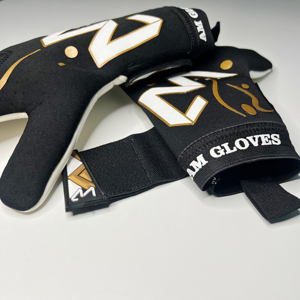 AM Nuoli Golden Edition goalkeeper gloves black gold wrist strap and AM Gloves logo detail