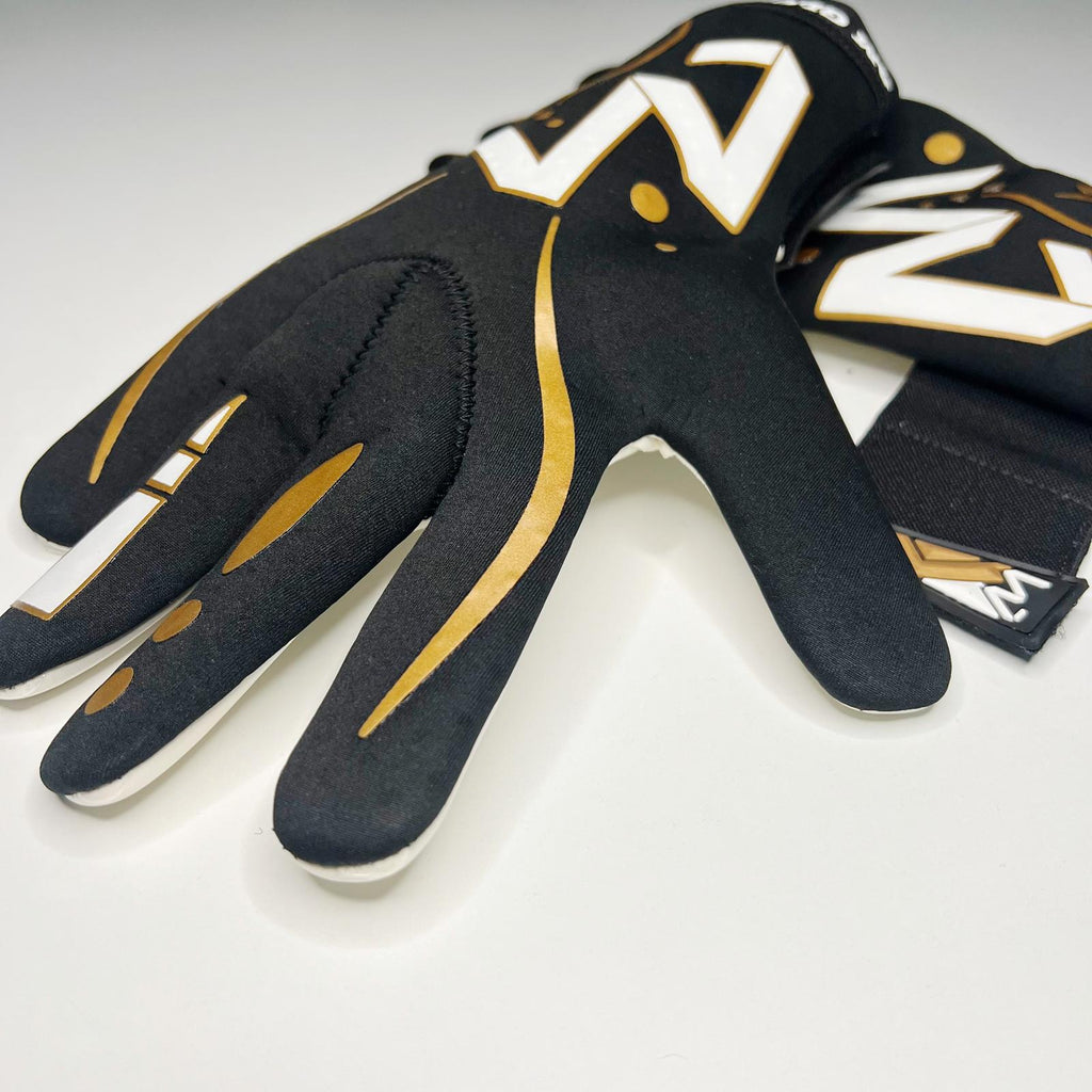 AM Nuoli Golden Edition goalkeeper gloves black gold backhand and finger detail side view – AM Gloves