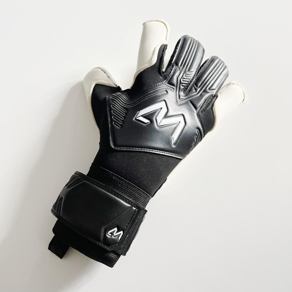 AM KUU Hybrid 2.0 goalkeeper gloves black wrist strap and elastic cuff close-up – AM Gloves